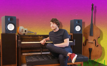 piano seated pink bg